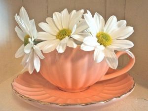 daisies in tea cup.jpg